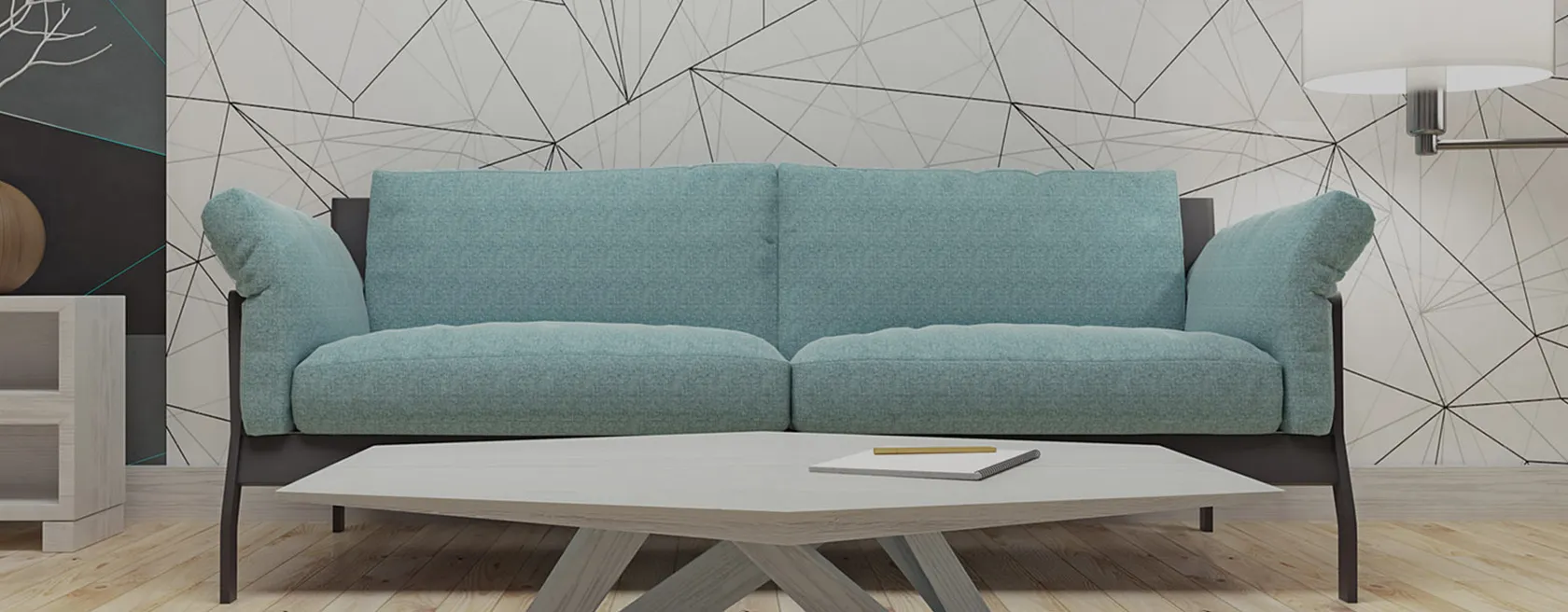 Canapé moderne gris bleu devant une table basse, dans un salon au mur géométrique